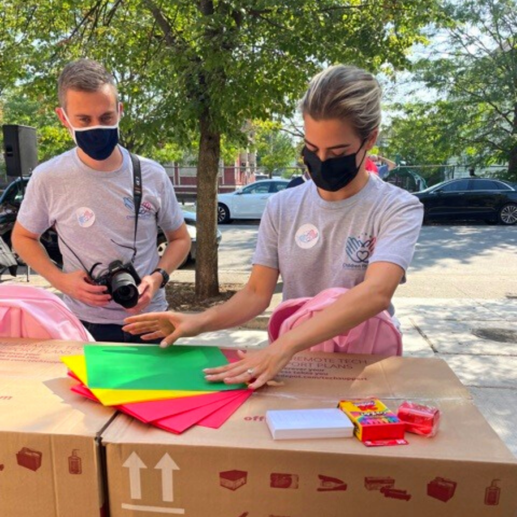 two cff team members organize supplies